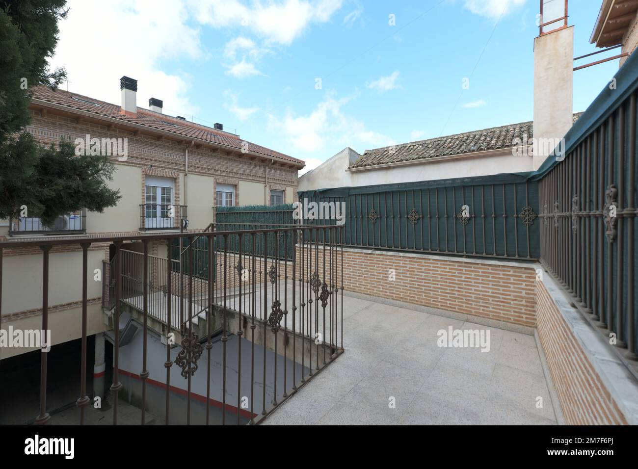 Exterior corridor of a semidetached singlefamily home on an access