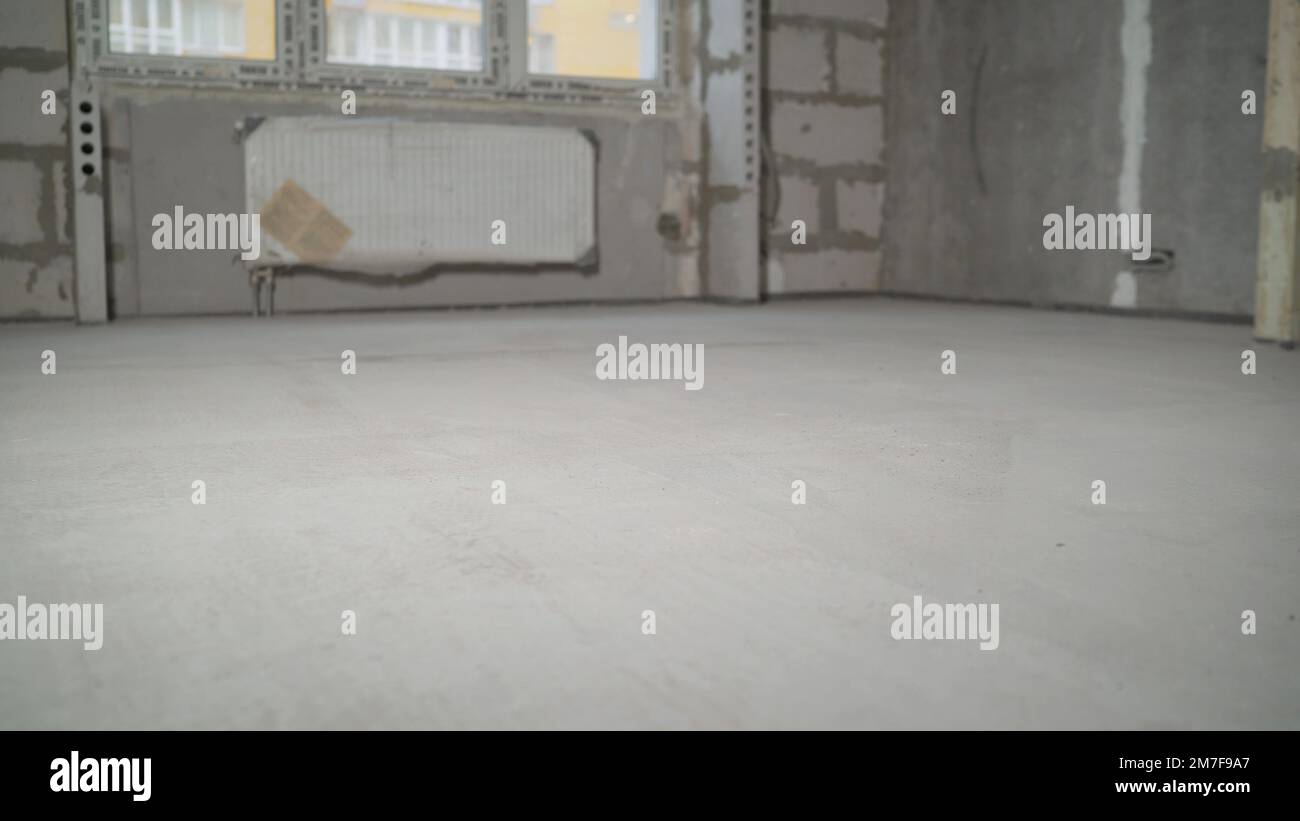 laid for the floor. Freshly laid concrete floor in the apartment