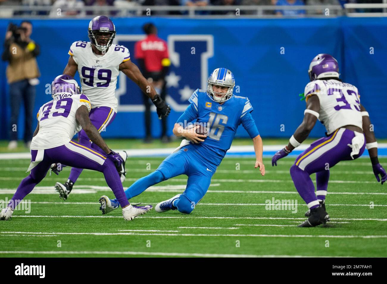 Detroit Lions quarterback Jared Goff (16) slides after running the ball