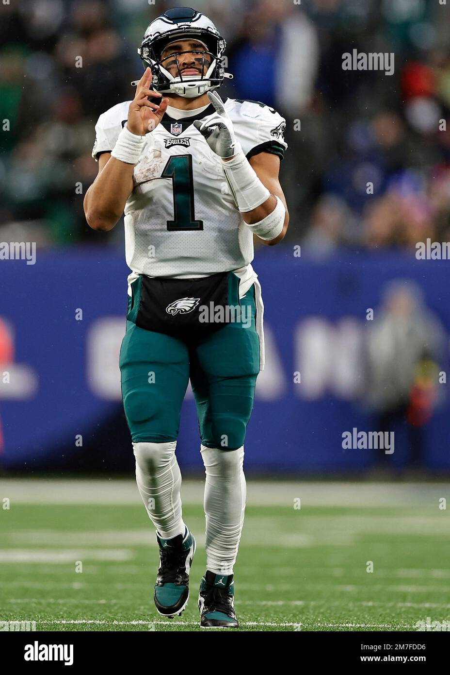 Philadelphia Eagles quarterback Jalen Hurts (1) reacts after a touchdown  against the New York Giants during an NFL football game Sunday, Dec. 11,  2022, in East Rutherford, N.J. (AP Photo/Adam Hunger Stock