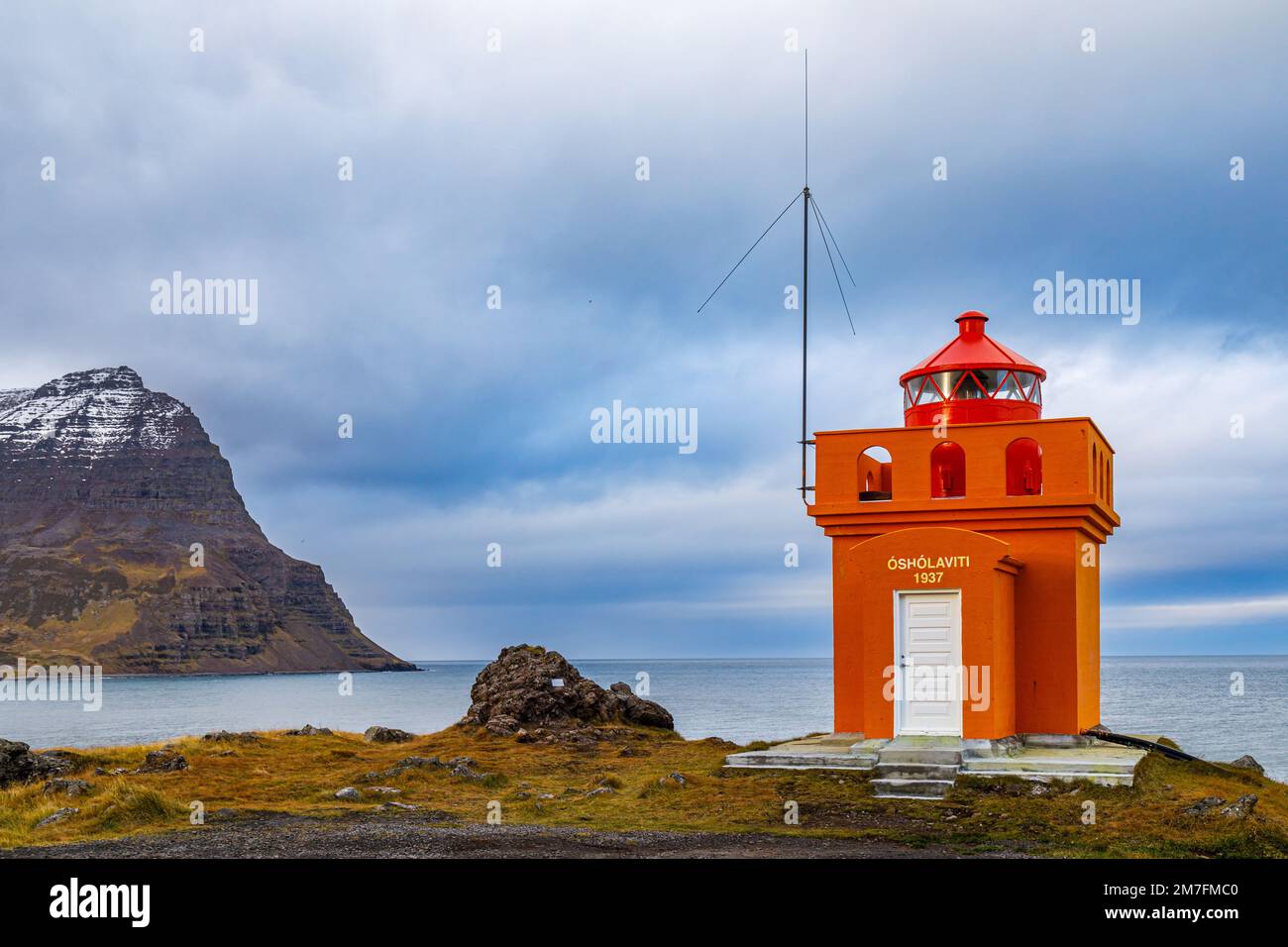 Lighthouse next to the village of Bolungarvik near the fjord Isafjardardjup in North Iceland Stock Photo