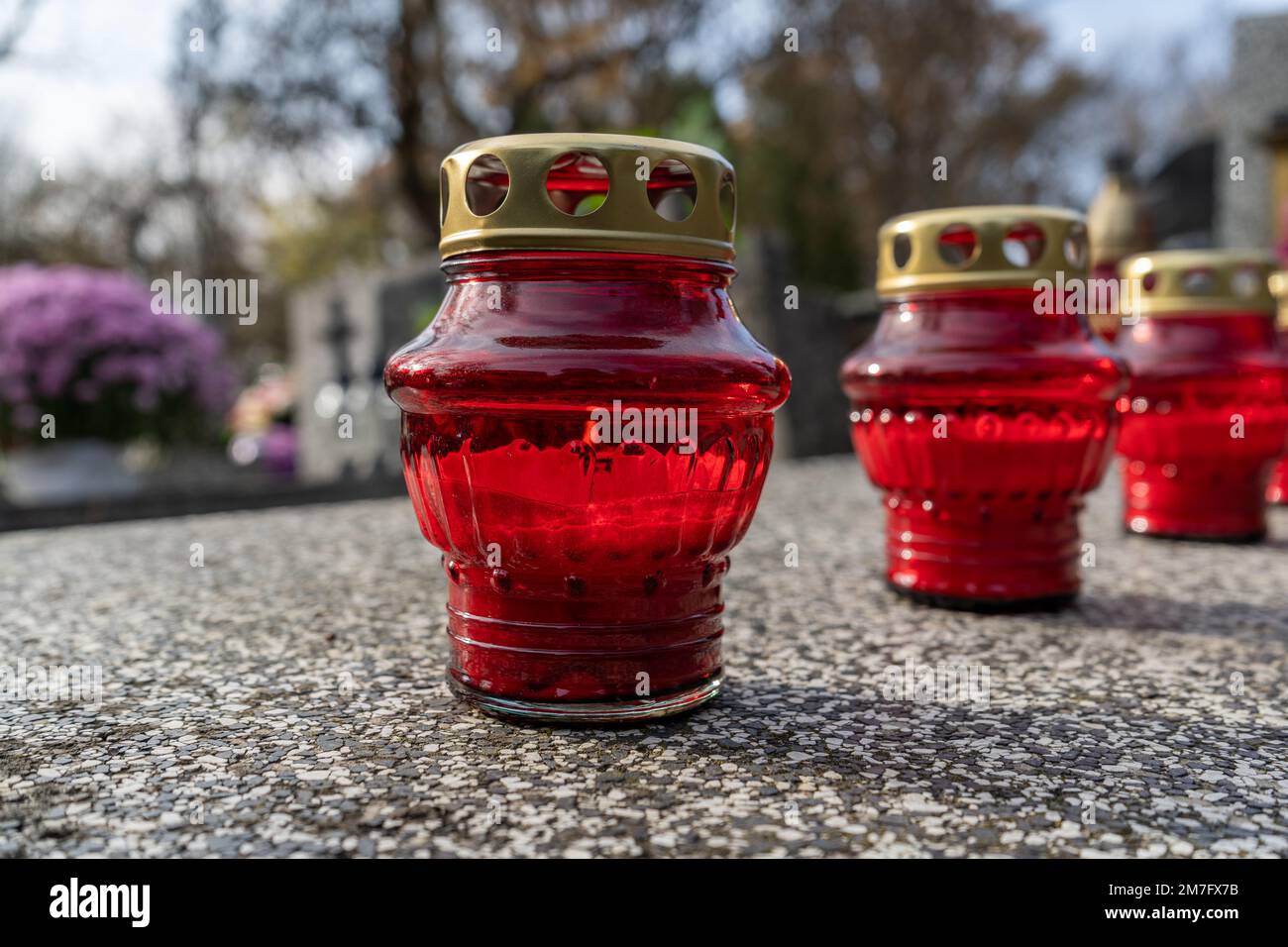 Cemetery grave candle glass lanterns. All Saints' Day, Feast of All