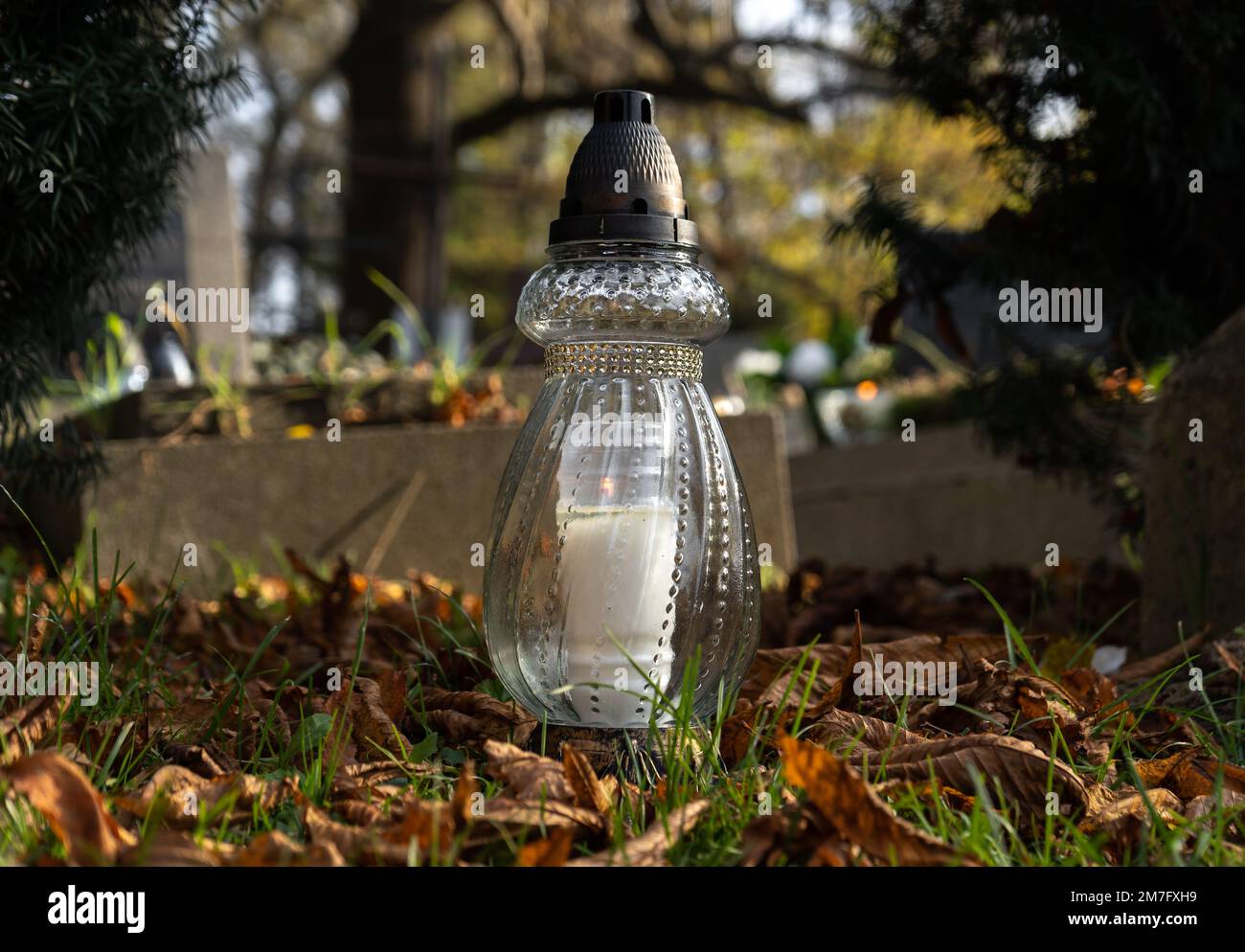 Cemetery grave candle glass lantern. All Saints' Day, Feast of All