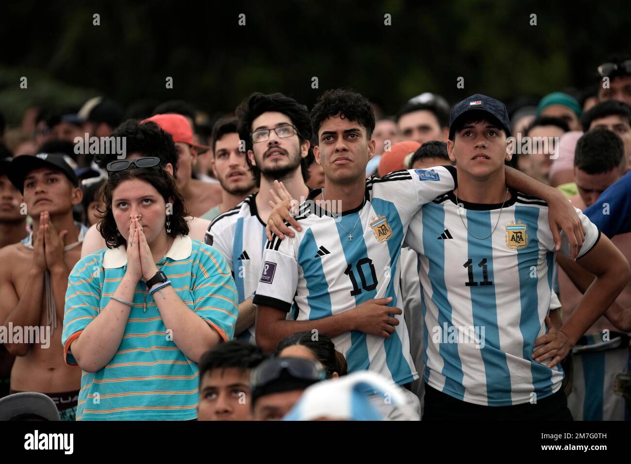 Argentina soccer fans watch their team's quarterfinal match against the