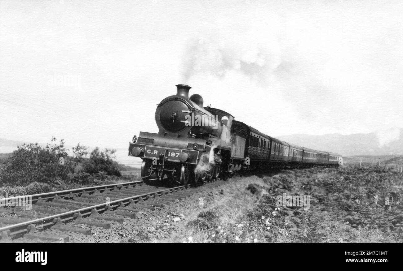 Caledonian Railway Pickersgill 191 Class 4-6-0 'Oban Bogie' No.197 with a train on the Oban line Stock Photo