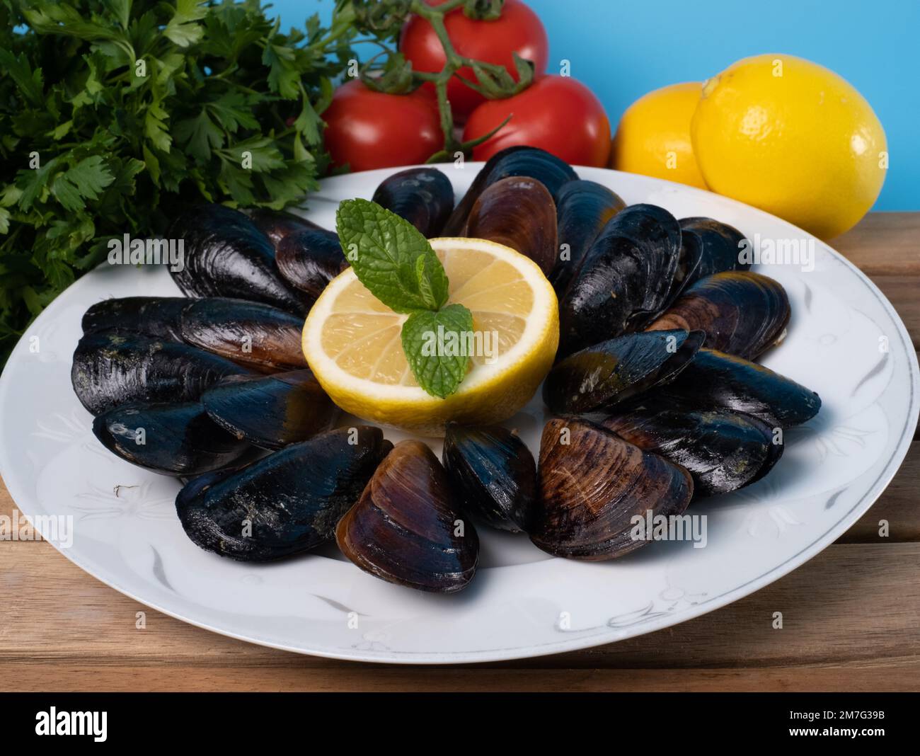 Turkish Street Food Stuffed Mussels and Lemon on Plate Isolated Yellow