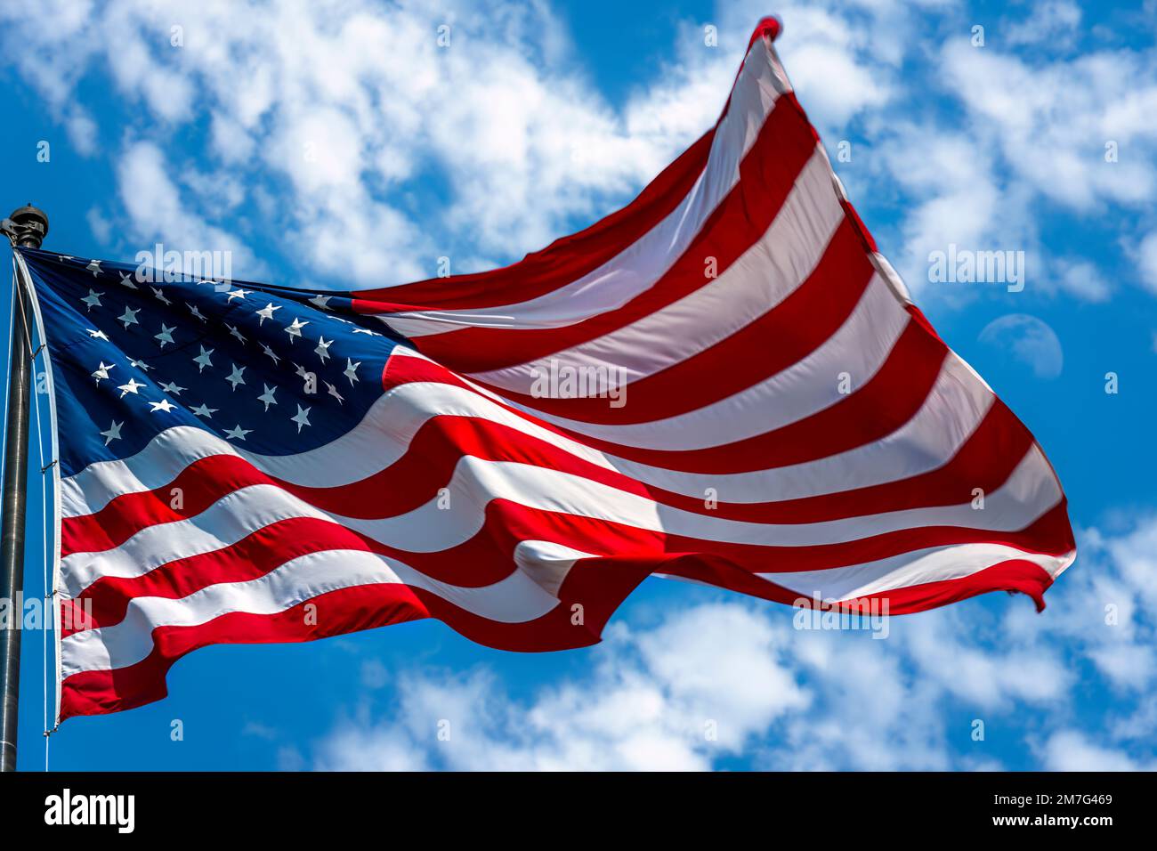The Stars & Stripes is the national flag of the United States of America. It consists of thirteen equal horizontal stripes of red and white with a blu Stock Photo
