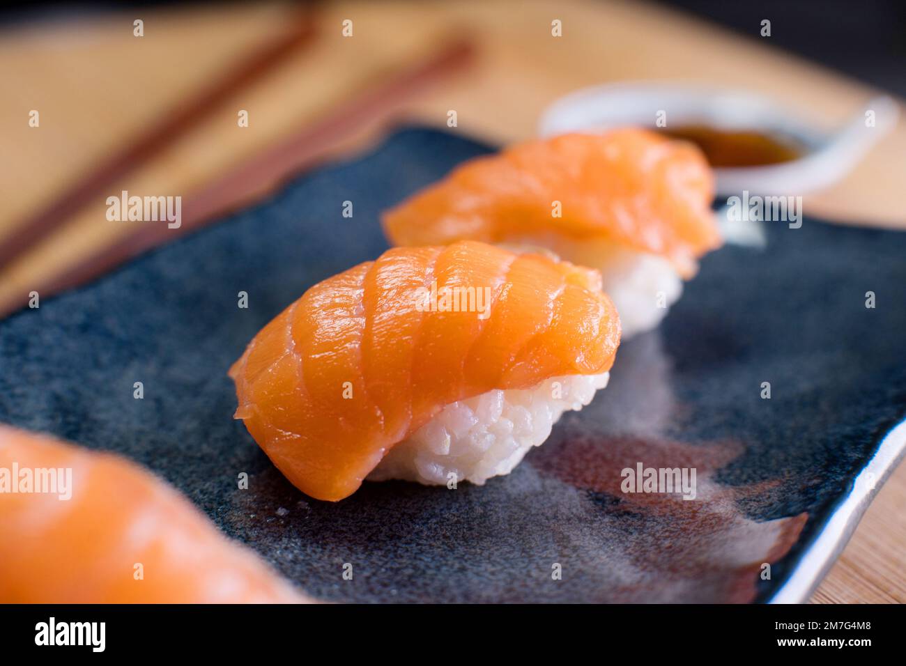 Salmon Japanese Nigiri in a Sushi restaurant in Tokyo Stock Photo Alamy