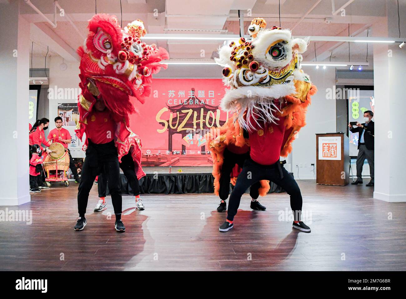 New York, USA. 8th Jan, 2023. Artists perform Chinese traditional lion dance at China Institute in Manhattan, New York, the United States, Jan. 8, 2023. Multiple events were staged in New York City on the weekend featuring intangible cultural heritage from east China's Suzhou. On Saturday night, Chinese artists presented Suzhou-style embroidery, Kunqu Opera and Pingtan, which is a form of ballad singing in Suzhou dialect with Chinese instruments, at the opening ceremony of the Suzhou theme day. Credit: Ziyu Julian Zhu/Xinhua/Alamy Live News Stock Photo