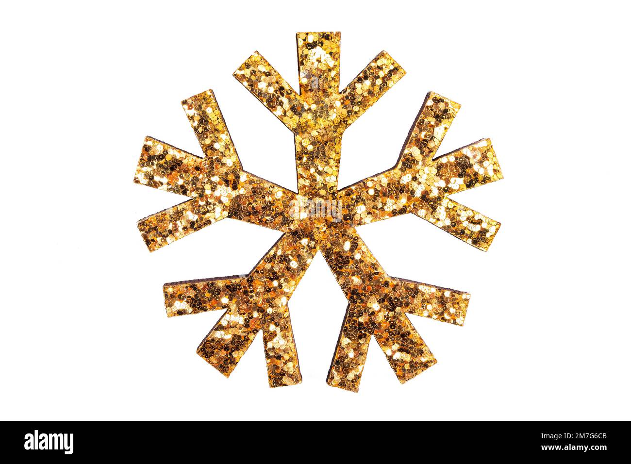 Golden snowflake isolated on white background Stock Photo