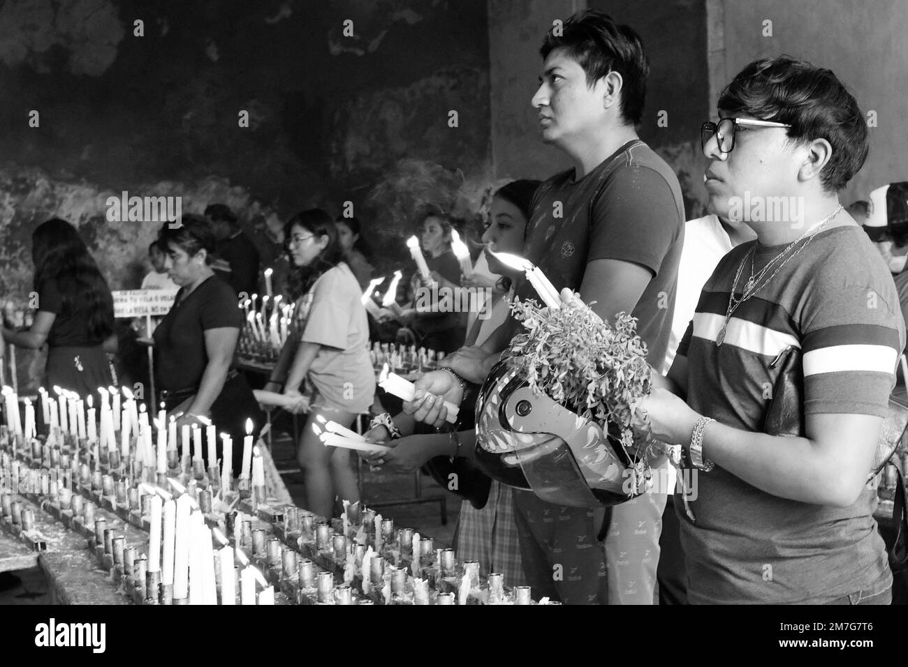 Christian faithful praying at church during the Three Kings Day celebrations , Tizimin Yucatan Mexico Stock Photo