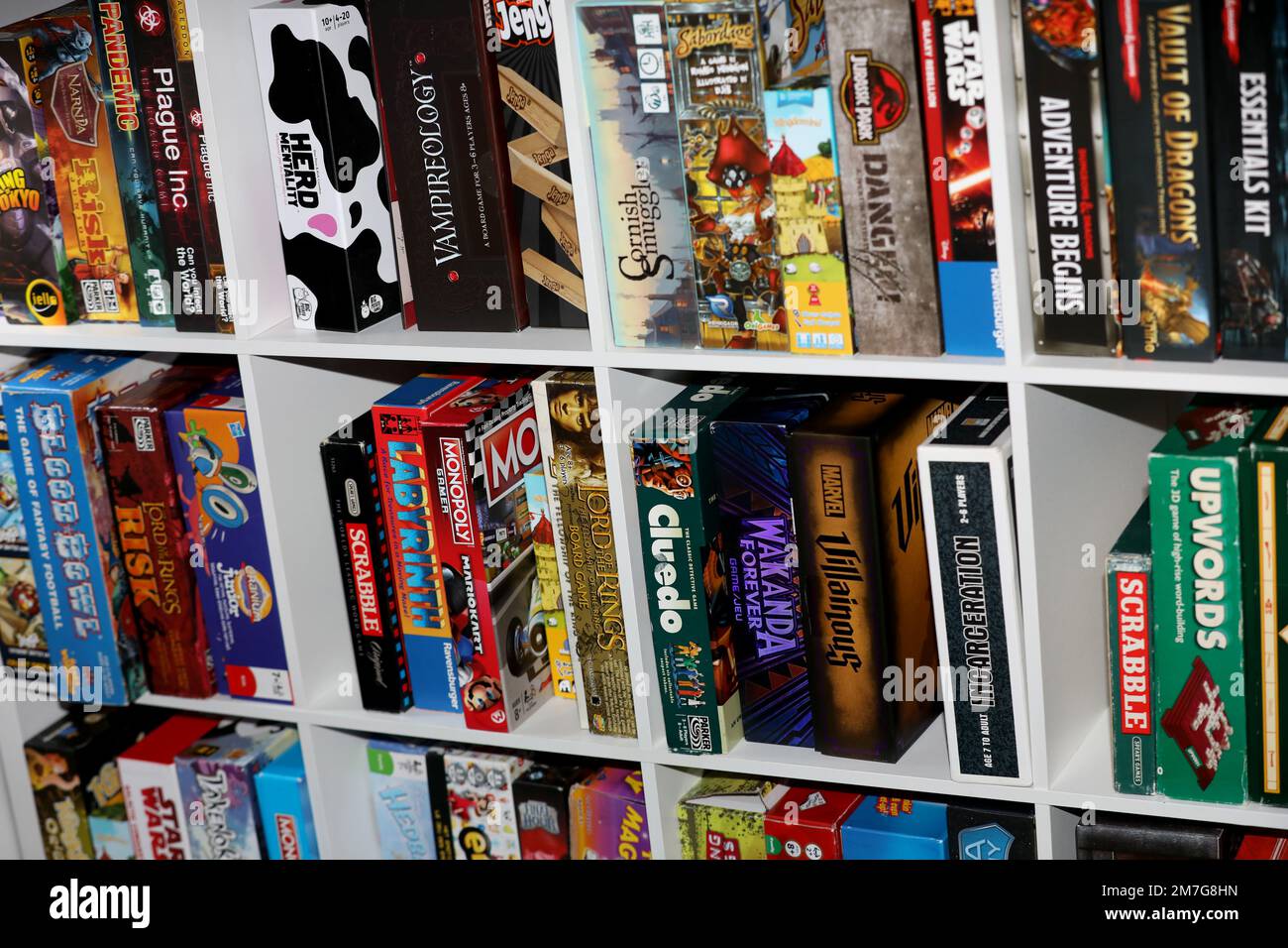 A shelf of board games on display to play in Havant, Hampshire, UK