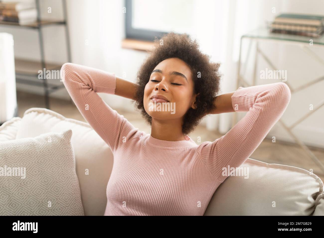 Happy young mixed race woman hi-res stock photography and images - Alamy
