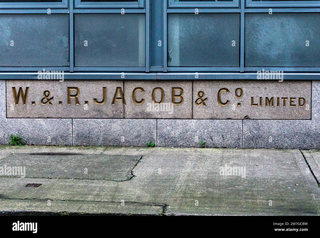 The old sign for W & R Jacob & Co. in Bishop Street, Dublin, Ireland. Jacobs manufactured biscuits here until the 1976. Stock Photo
