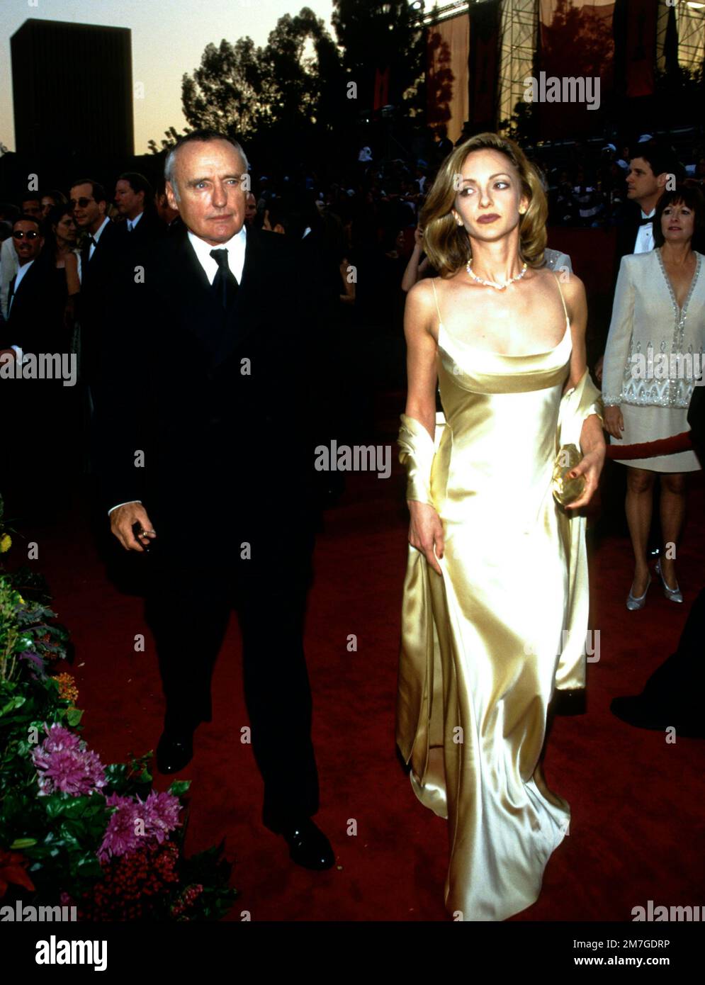 Dennis Hopper & his wife arriving at the Academy Awards in 1997 Credit Ron Wolfson / MediaPunch