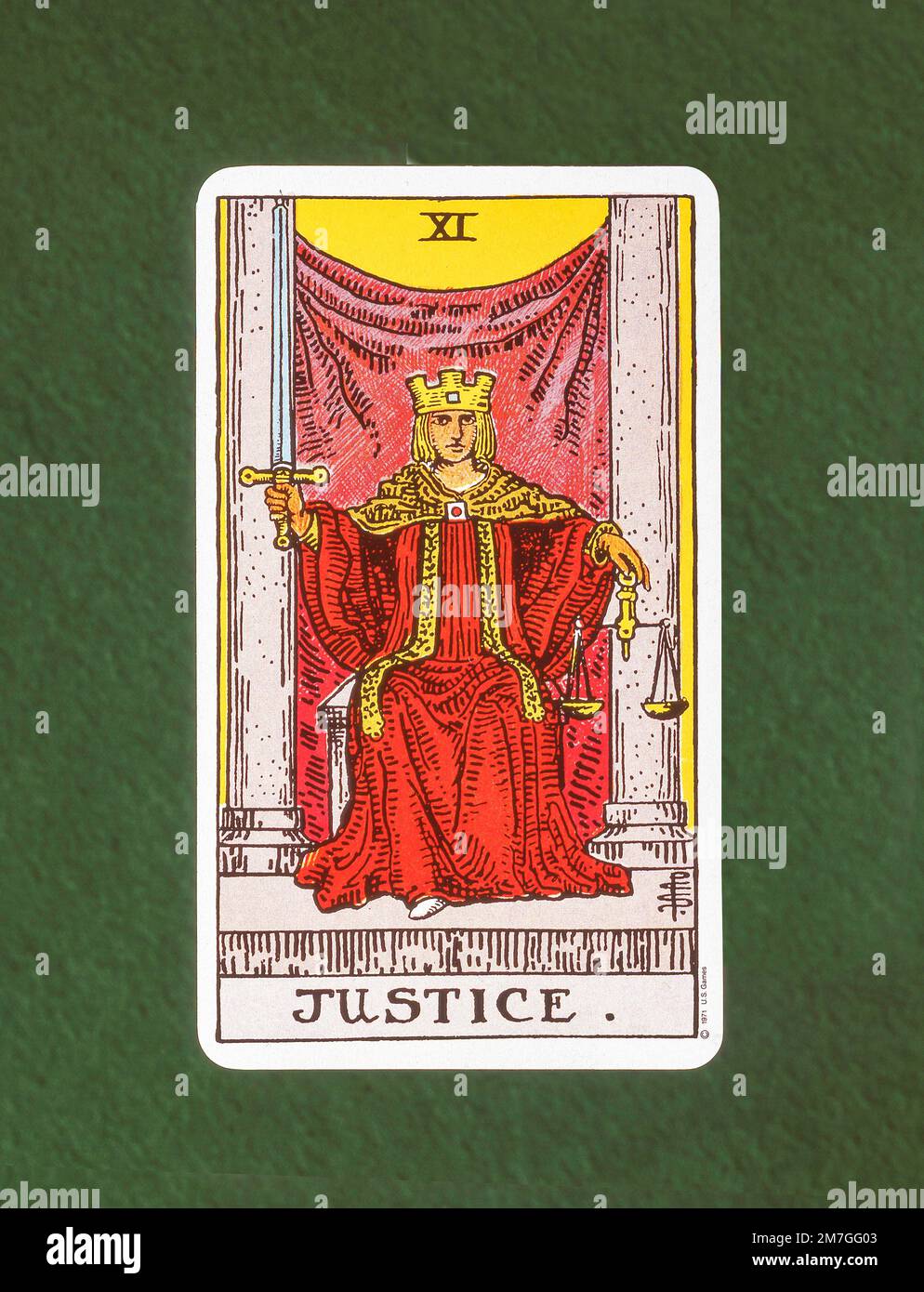 The Justice Major Arcana tarot card on felt card table, Greater London, England, United Kingdom Stock Photo
