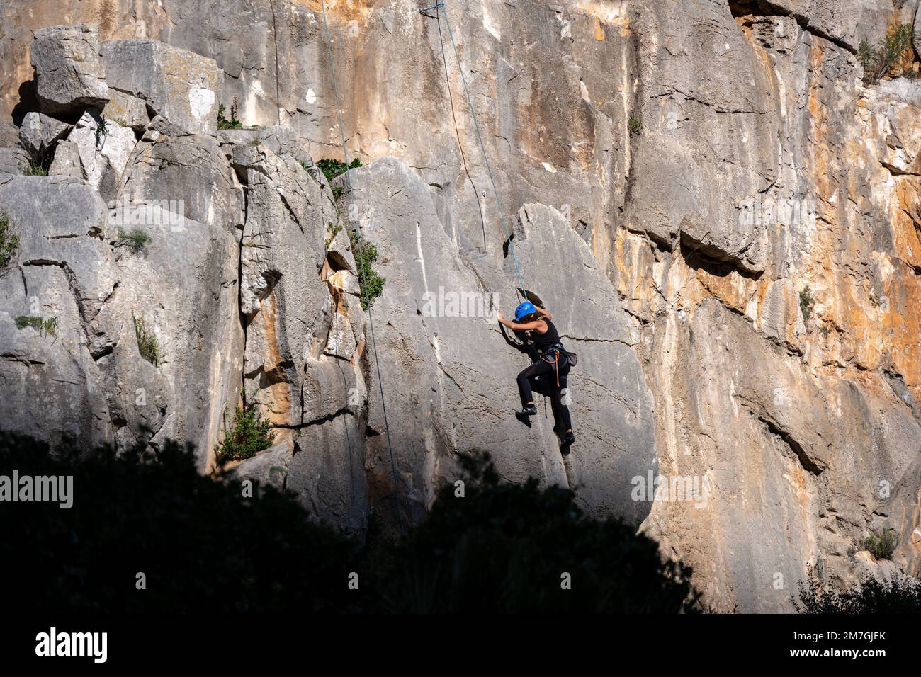 A woman rock climbing in Andalucia, Spain Stock Photo