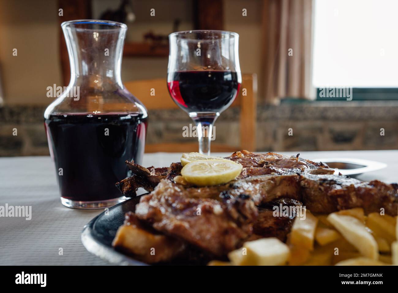 Menu food of pork chops , french fries and red wine Stock Photo