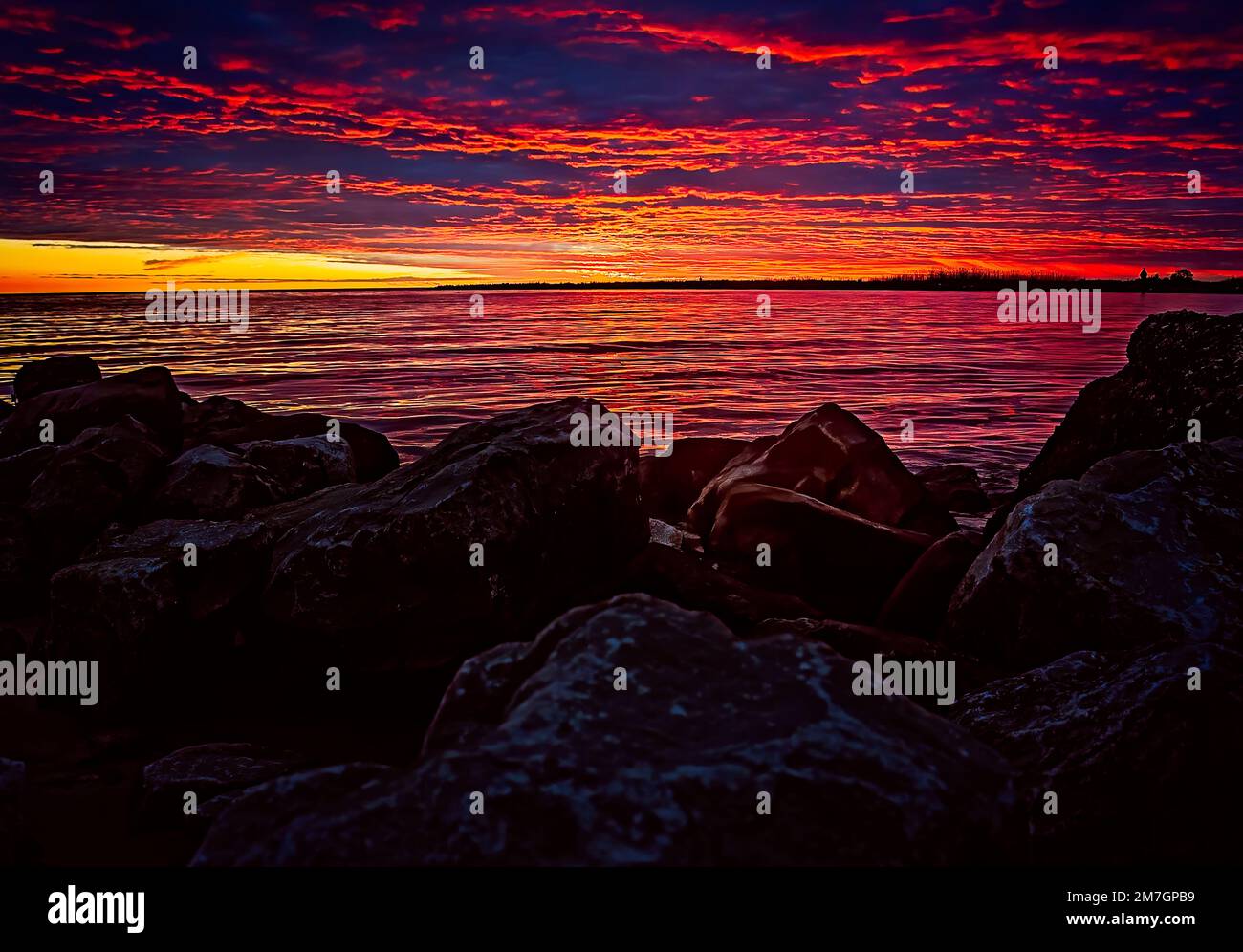 The sun sets over the bayou, Jan. 8, 2023, in Bayou La Batre, Alabama