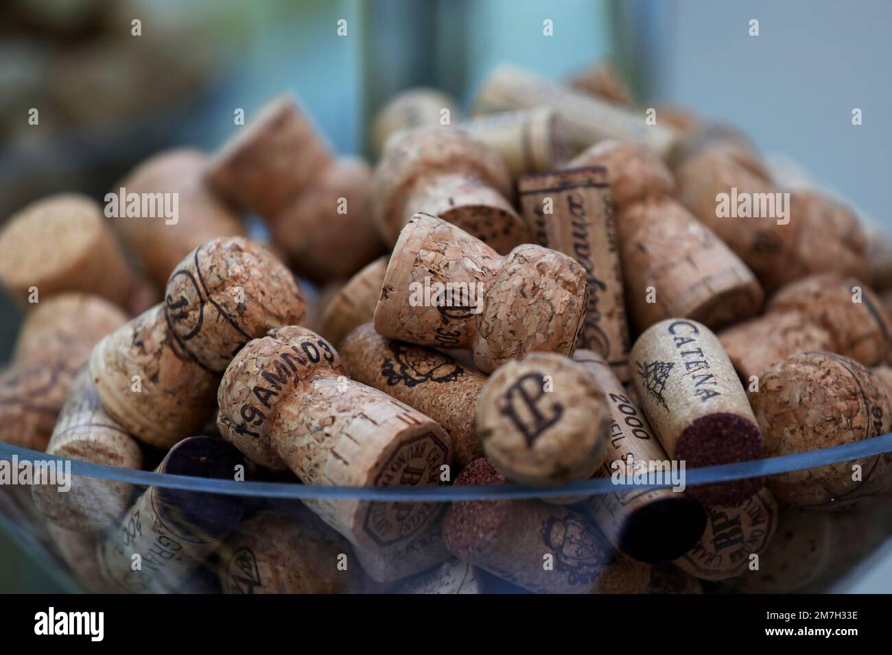 Wine bottle corks pictured in a glass bowl in a hotel in Sussex, UK Stock Photo Alamy