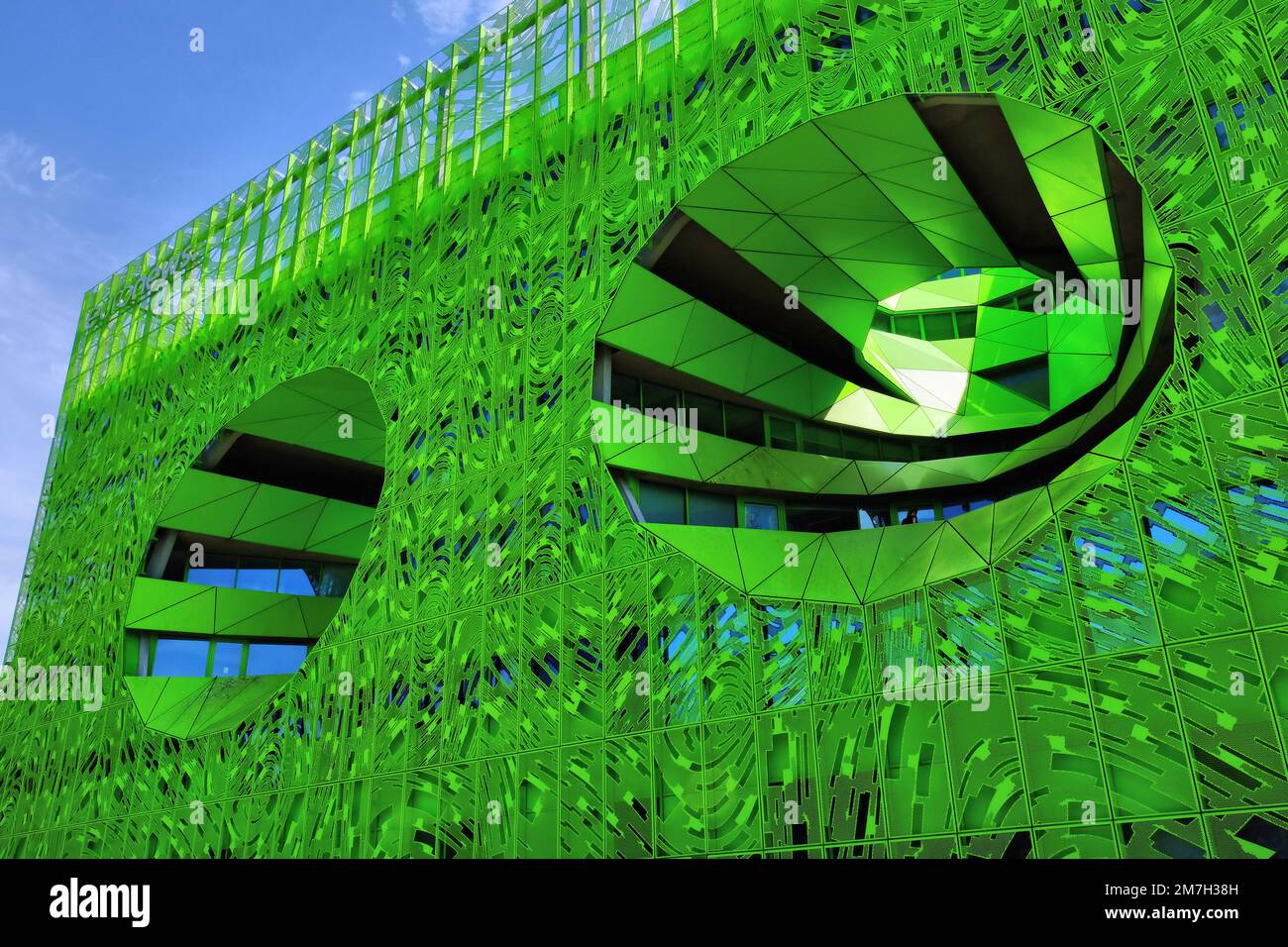 Lyon: Modern architecture of green cube (cube vert) Euronews building by architects Jacob and Macfarlane in La Confluence, Lyon, France Stock Photo