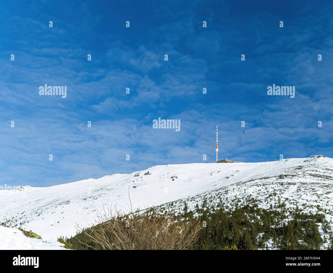 TV tower of Kralova Hola Slovakia Low Tatras Nizke Tatry in winter snowy mountain landscape Stock Photo
