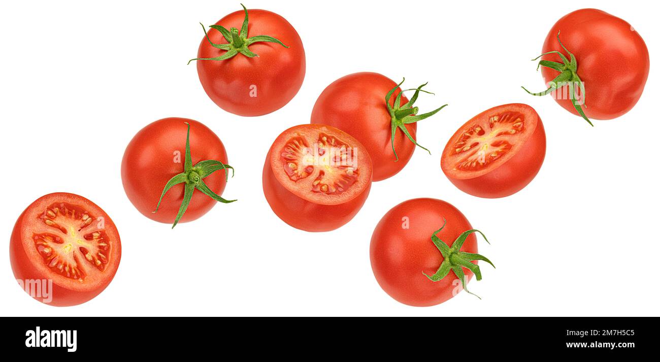 Falling cherry tomatoes isolated on white background Stock Photo