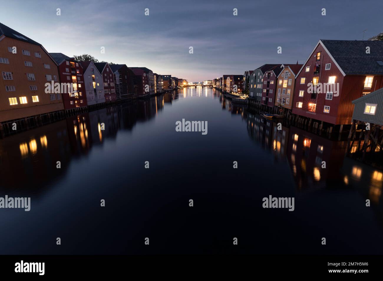 Long Exposure of colored houses along Nidelva River in Trondheim Stock Photo