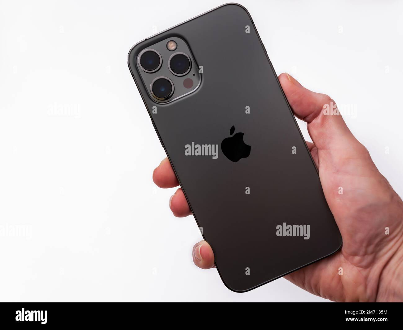The iPhone 12 Pro Max is Apple’s most advanced and largest 5G cell phone. The phone features 3 rear facing cameras and a LiDAR sensor. Stock Photo