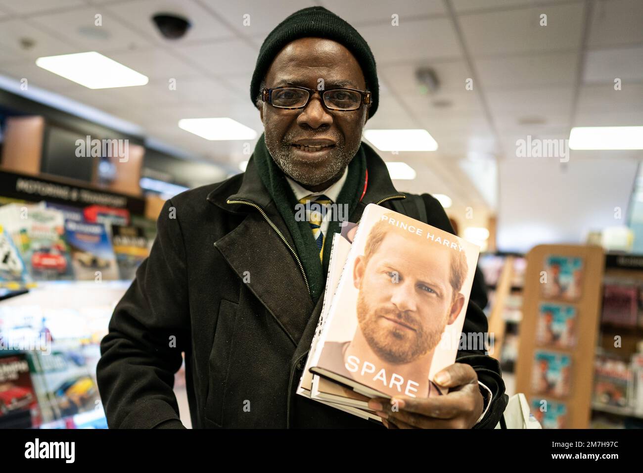 Professor Chris Imafidon with the newly released autobiography from the Duke of Sussex at WHSmith's in Victoria Station, London, where the book became available to purchase at midnight. Picture date: Tuesday January 10, 2023. Stock Photo
