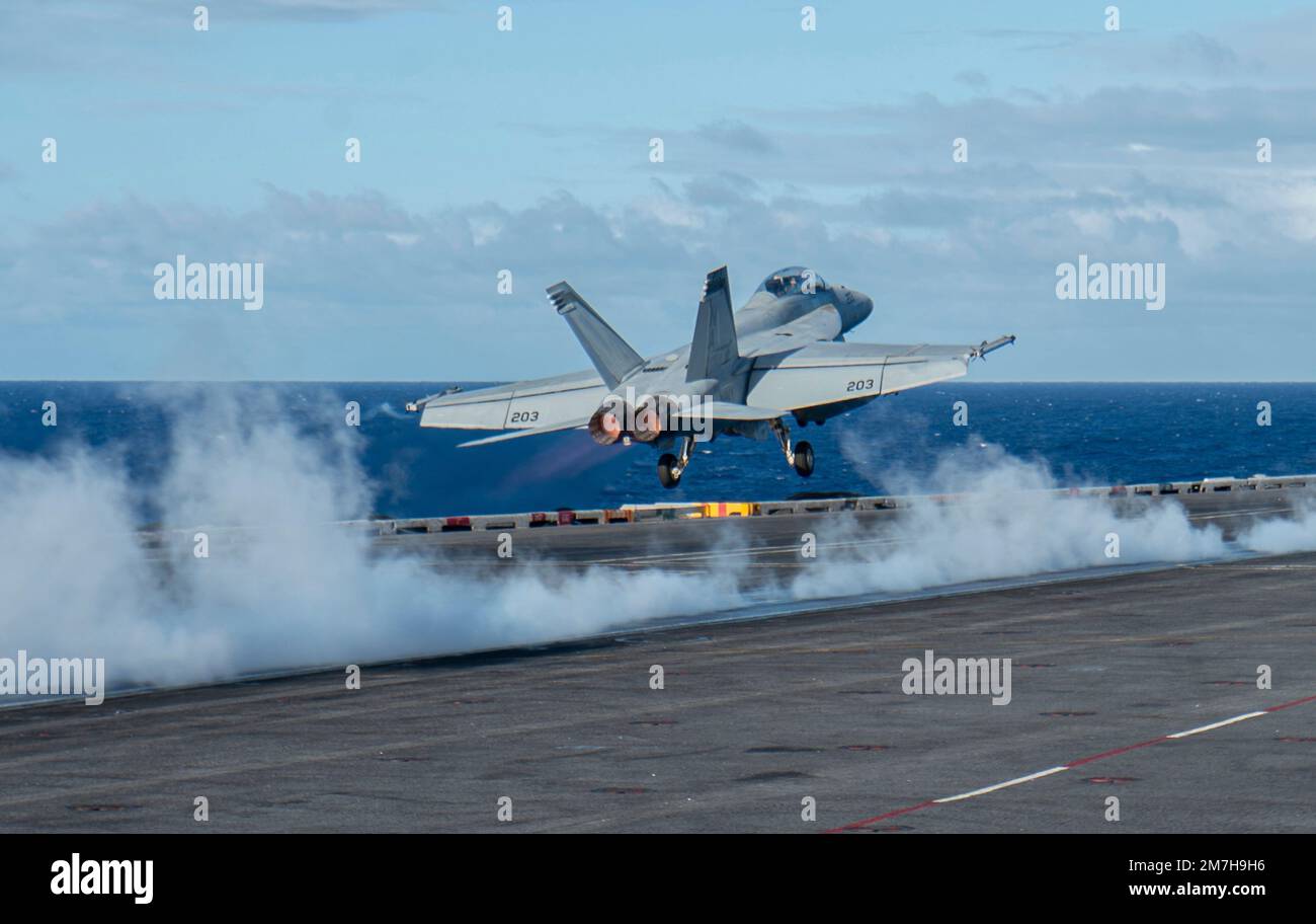 USS Nimitz, United States. 31 December, 2022. A U.S. Navy F/A-18E Super Hornet fighter aircraft from the Mighty Shrikes of Strike Fighter Squadron 94, launches on the flight deck of the Nimitz-class aircraft carrier USS Nimitz underway conducting routine operations, December 31, 2022 in the Philippine Sea.  Credit: MC2 Justin McTaggart/U.S Navy Photo/Alamy Live News Stock Photo