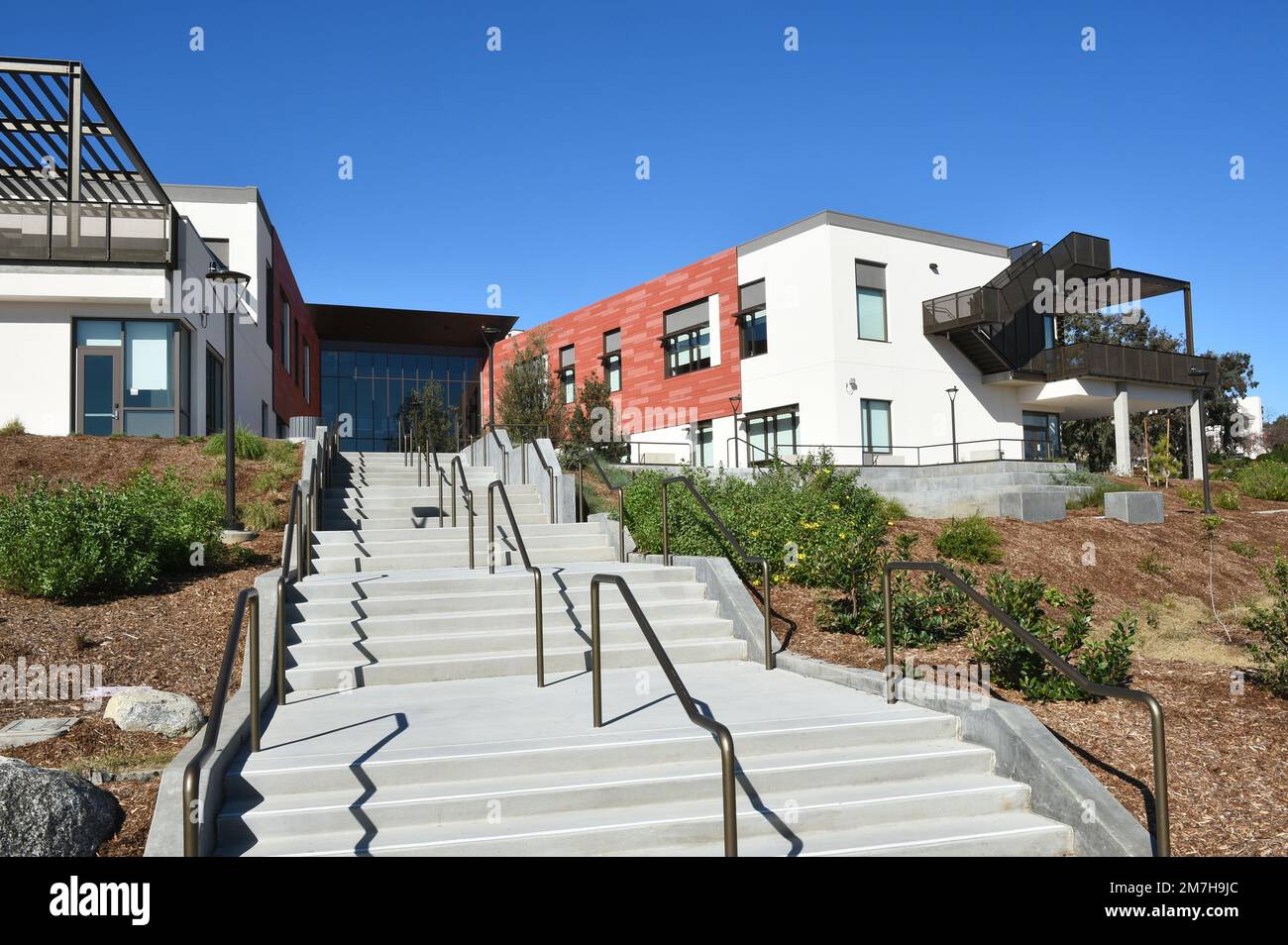MISSION VIEJO, CALIFORNIA - 8 JAN 2023: Rear Entrance Stairs  to the Advanced Technology and Applied Science Building, ATAS, on the Campus of Saddleba Stock Photo