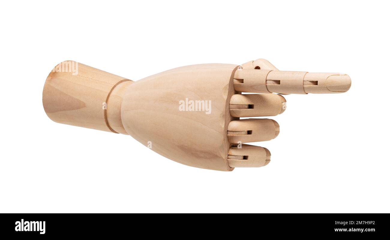 Wooden mannequin hand pointing against white background. Gesture. Stock Photo