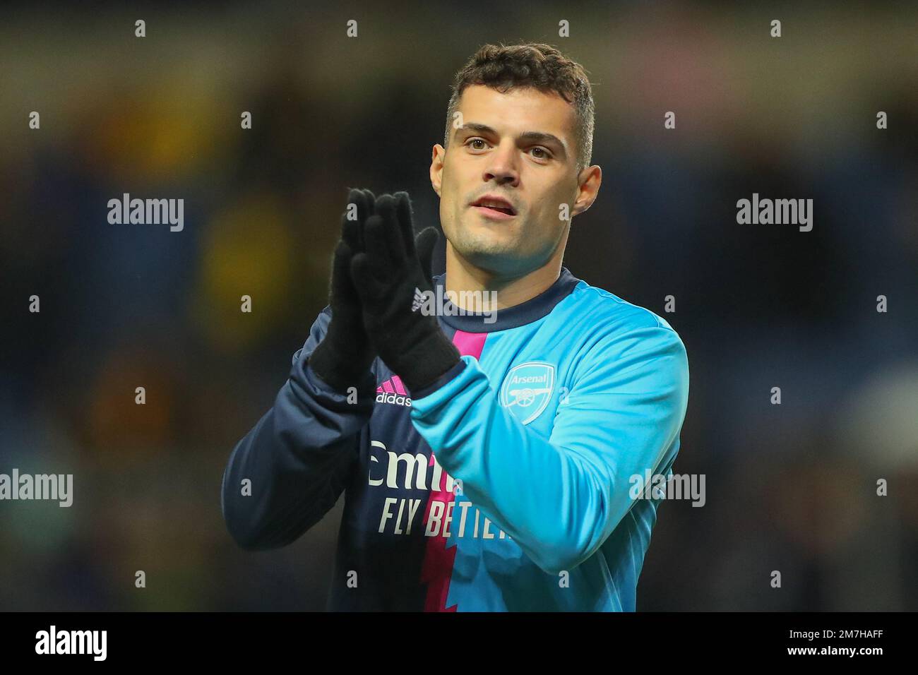 Granit Xhaka #34 of Arsenal applauds the fans during the pre-game warm up ahead of the Emirates FA Cup Third Round match Oxford United vs Arsenal at Kassam Stadium, Oxford, United Kingdom, 9th January 2023  (Photo by Gareth Evans/News Images) Stock Photo