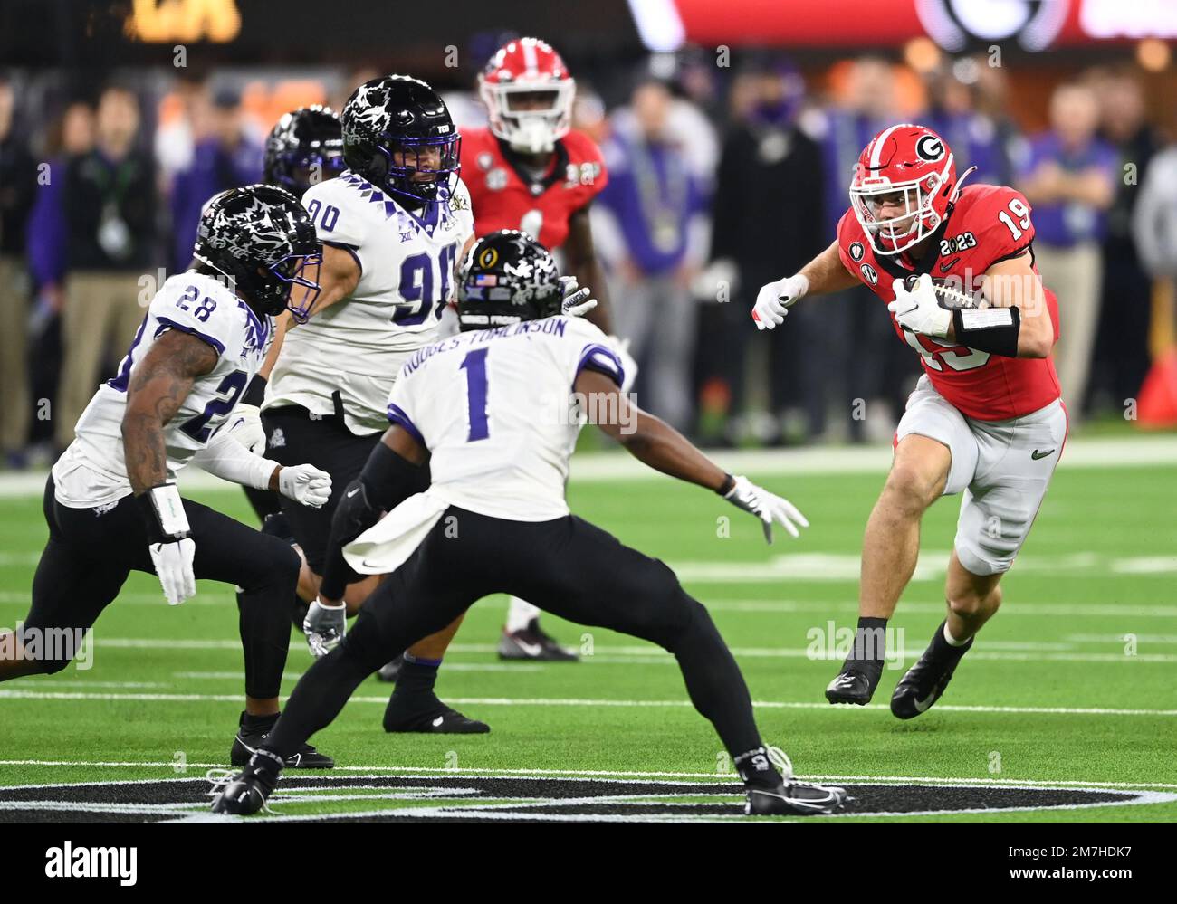 Inglewood, United States. 09th Jan, 2023. Georgia Bulldogs Brock Bowers carries the football in the first quarter against the TCU Horned Frogs at the 2023 NCAA College Football National Championship between Georgia and TCU at SoFi Stadium in Inglewood, California, on Monday, January 9, 2023. Photo by Mike Goulding/UPI Credit: UPI/Alamy Live News Stock Photo