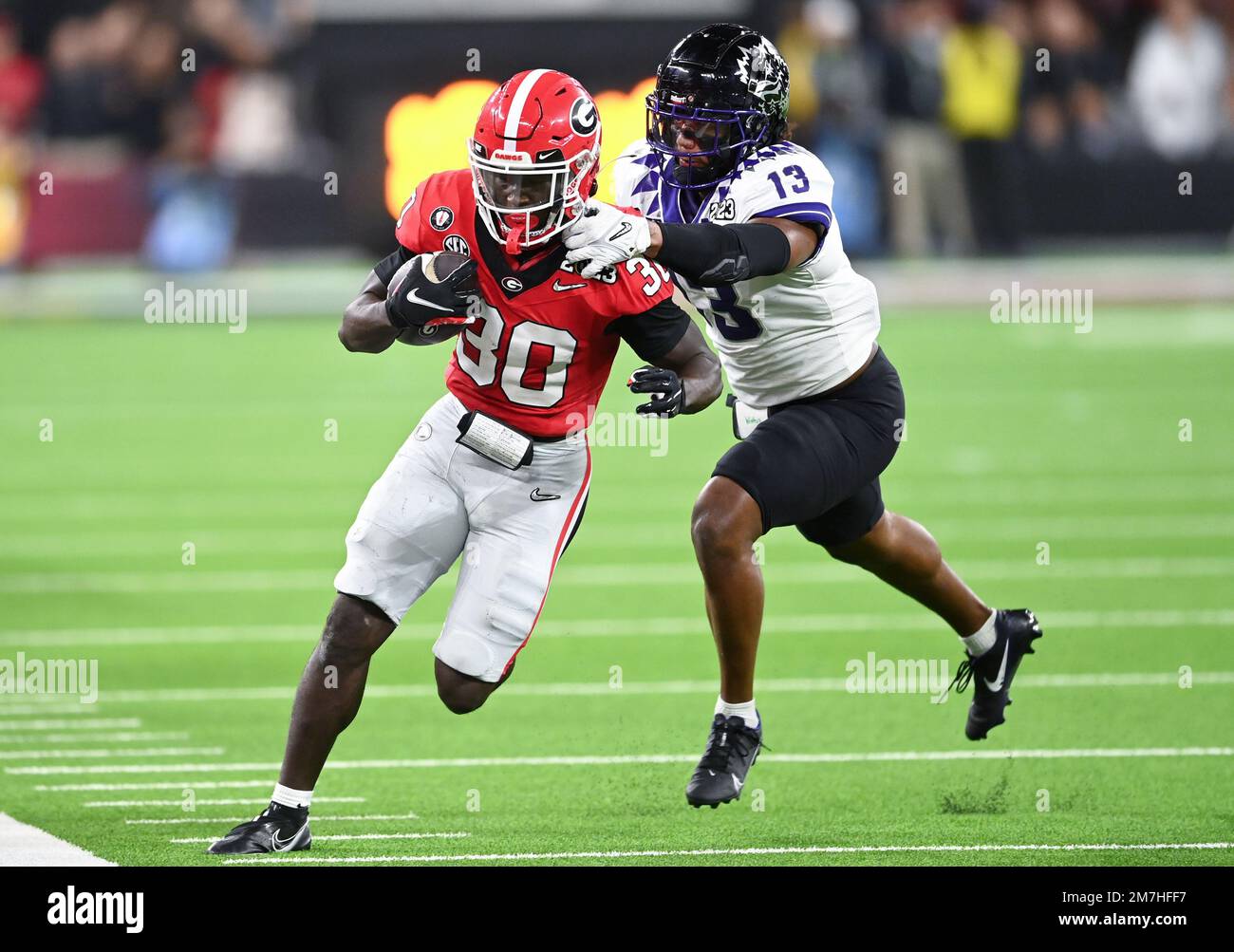 Inglewood, United States. 09th Jan, 2023. Georgia Bulldogs Daijun Edwards carries the football in the second quarter against the TCU Horned Frogs at the 2023 NCAA College Football National Championship between Georgia and TCU at SoFi Stadium in Inglewood, California, on Monday, January 9, 2023. Photo by Mike Goulding/UPI Credit: UPI/Alamy Live News Stock Photo