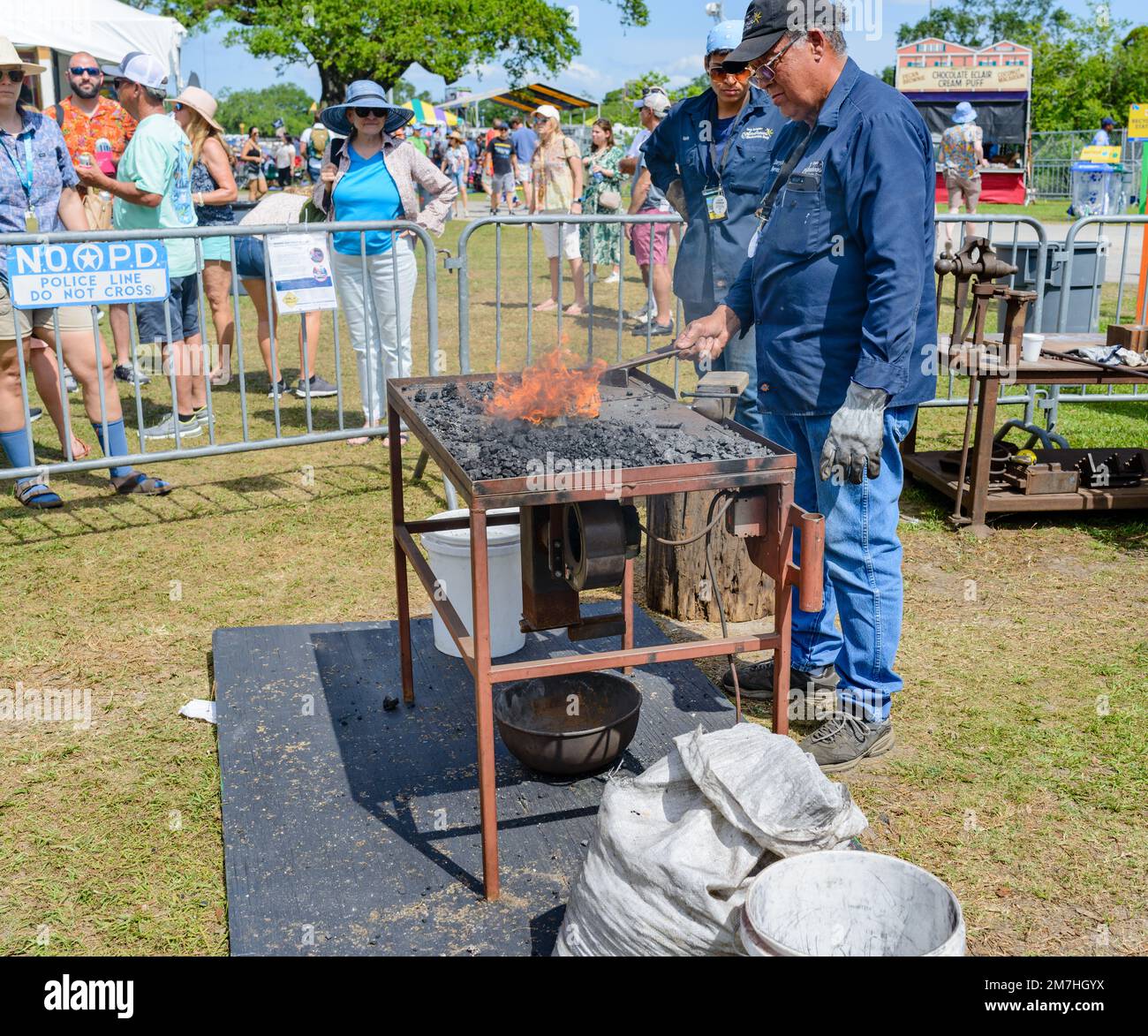 NEW ORLEANS, LA, USA - APRIL 29, 2022: Blacksmith demonstrating the toolmaking craft at the New Orleans Jazz and Heritage Festival Stock Photo