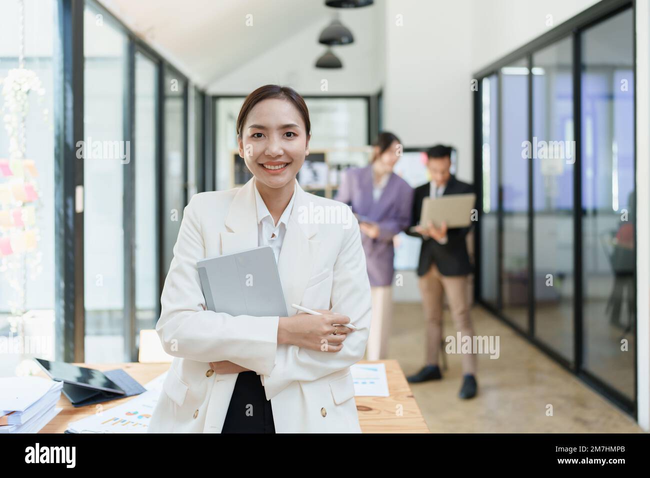 Computer Business Owner Portrait of a male business owner showing a happy smiling face as he ...