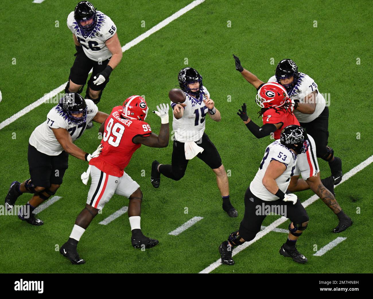 Inglewood, United States. 09th Jan, 2023. TCU quarterback Max Duggan is pressured by the Georgia defense in the fourth quarter in the 2023 NCAA College Football National Championship at SoFi Stadium in Inglewood, California, on Monday, January 9, 2023. The Bulldogs defeated the TCU Horned Frogs 65-7. Photo by Jon SooHoo/UPI Credit: UPI/Alamy Live News Stock Photo