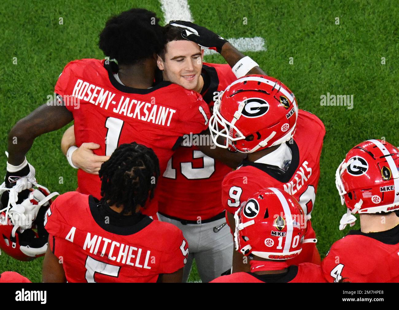 Inglewood, United States. 09th Jan, 2023. Georgia quarterback Stetson Bennett is congratulated by teammates in the 2023 NCAA College Football National Championship against TCU at SoFi Stadium in Inglewood, California, on Monday, January 9, 2023. The Bulldogs defeated the TCU Horned Frogs 65-7. Photo by Jon SooHoo/UPI Credit: UPI/Alamy Live News Stock Photo