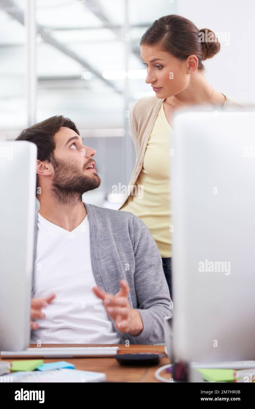 Collaborating with my colleague. a businessman explaining something to his clleague. Stock Photo