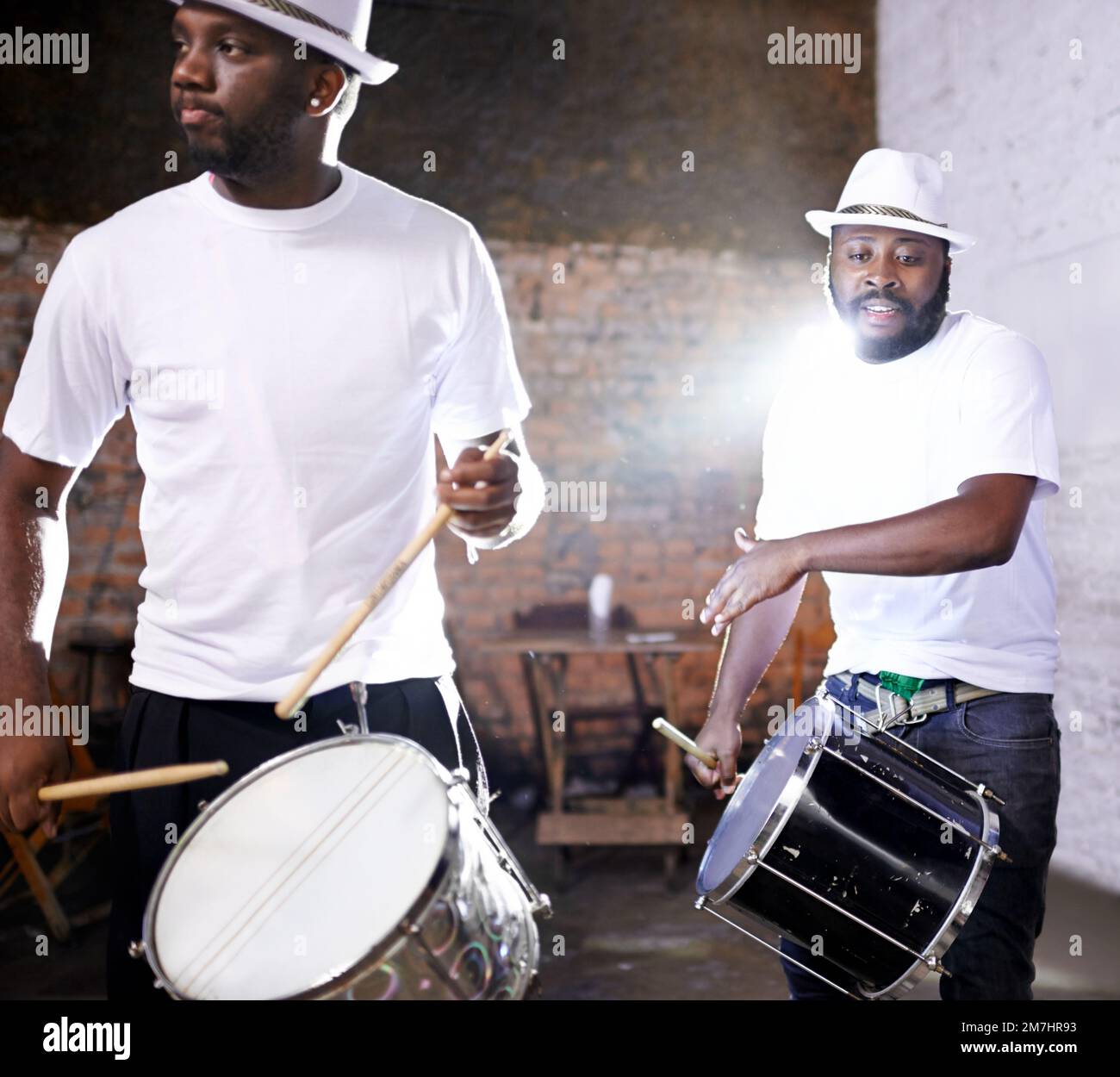 Playing to the Brazilian beat. a band playing their percussion