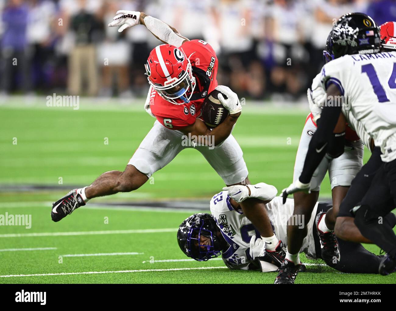 Inglewood, United States. 09th Jan, 2023. Kenny McIntosh #6 of the Georgia Bulldogs carries the football in the second half against the TCU Horned Frogs at the CFP National Championship game at SoFi Stadium in Inglewood, California, on Monday, January 9, 2023. Georgia defeated TCU 65-7. Photo by Mike Goulding/UPI Credit: UPI/Alamy Live News Stock Photo