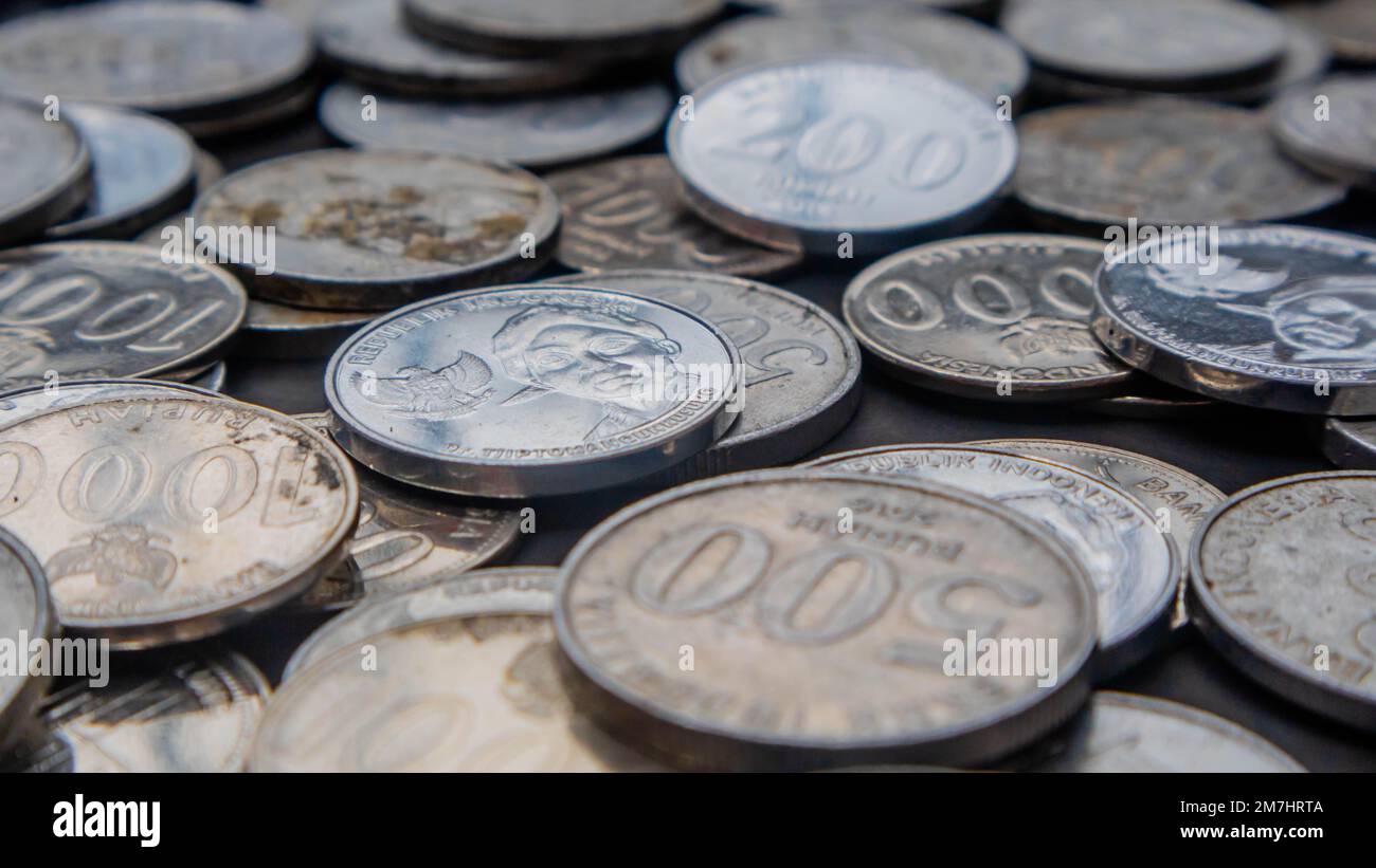 pile of rupiah coins as background Stock Photo - Alamy