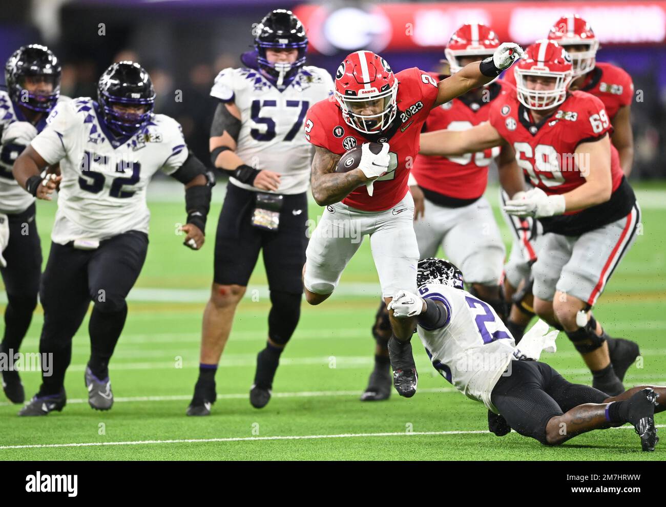 Inglewood, United States. 09th Jan, 2023. Kendall Milton #2 of the Georgia Bulldogs carries the football in the second half against the TCU Horned Frogs at the CFP National Championship game at SoFi Stadium in Inglewood, California, on Monday, January 9, 2023. Georgia defeated TCU 65-7. Photo by Mike Goulding/UPI Credit: UPI/Alamy Live News Stock Photo