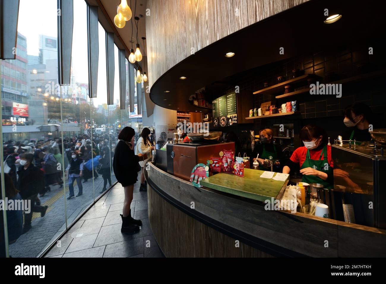Starbucks Coffee by the Shibuya crossing in  Tokyo, Japan. Stock Photo