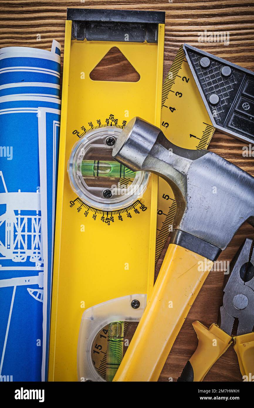 Blue engineering drawings construction level square ruler claw hammer ...