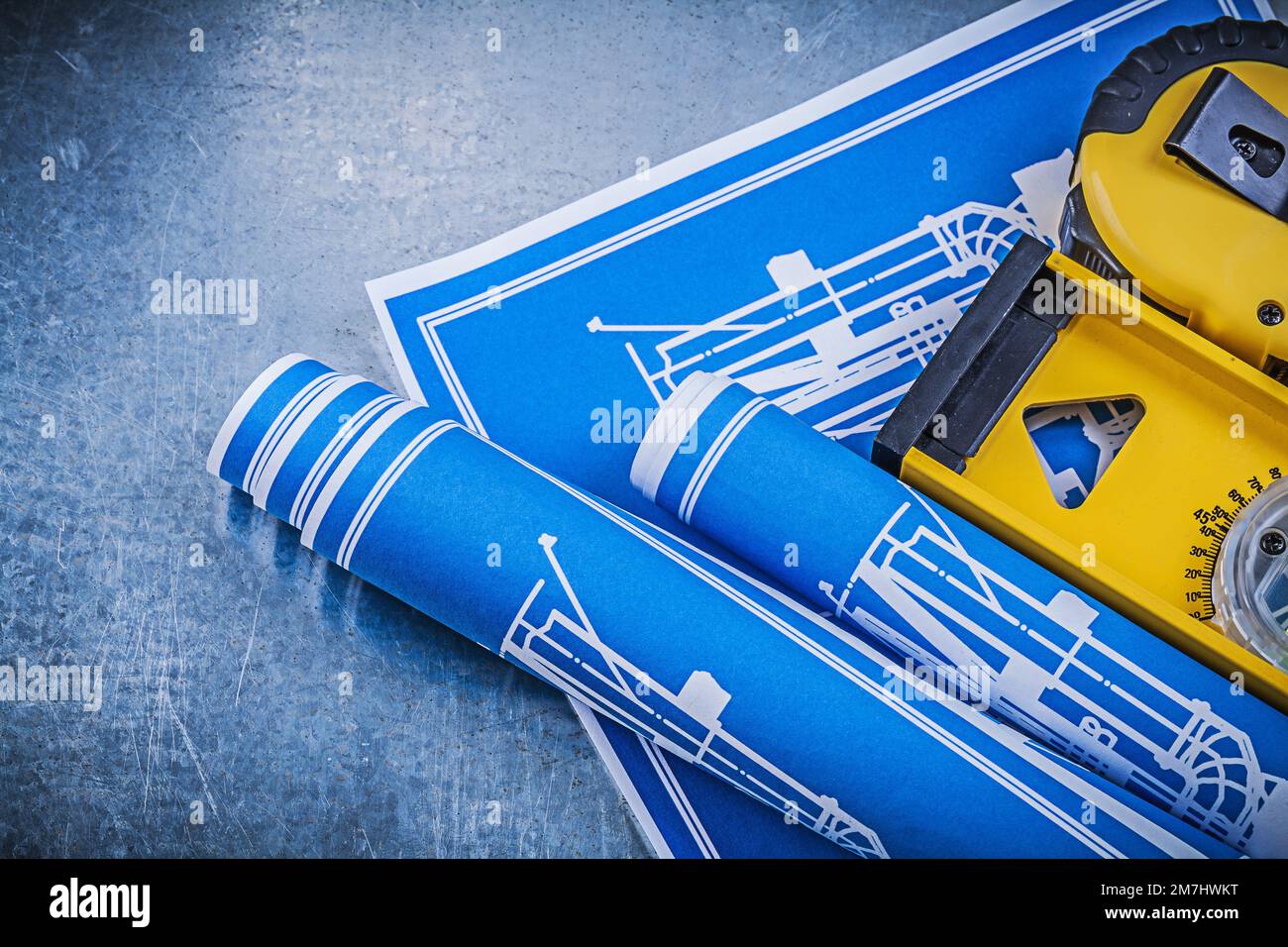 Blue engineering drawings level tape line on metallic background Stock Photo Alamy