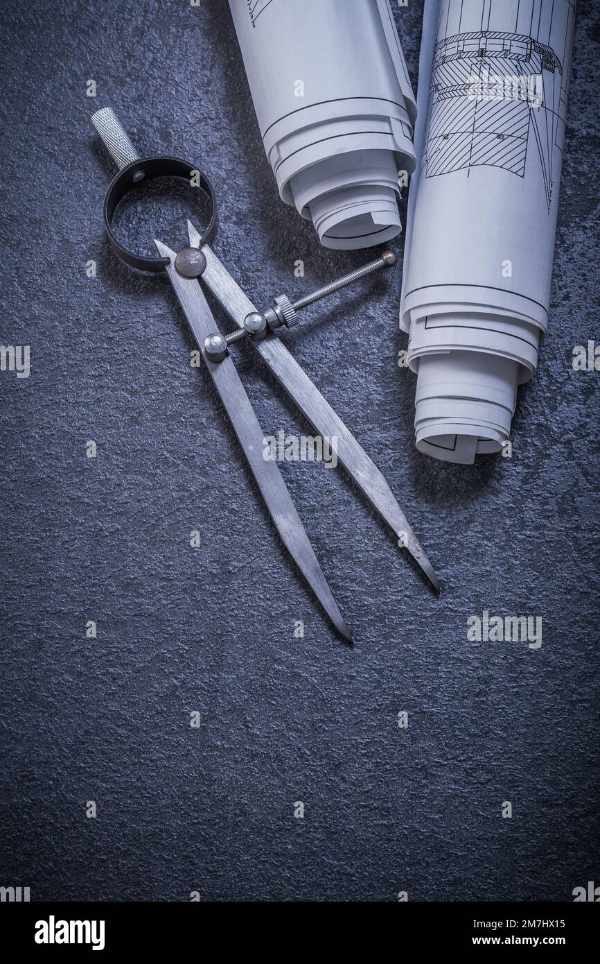 Blueprints divider on black background construction concept. Stock Photo