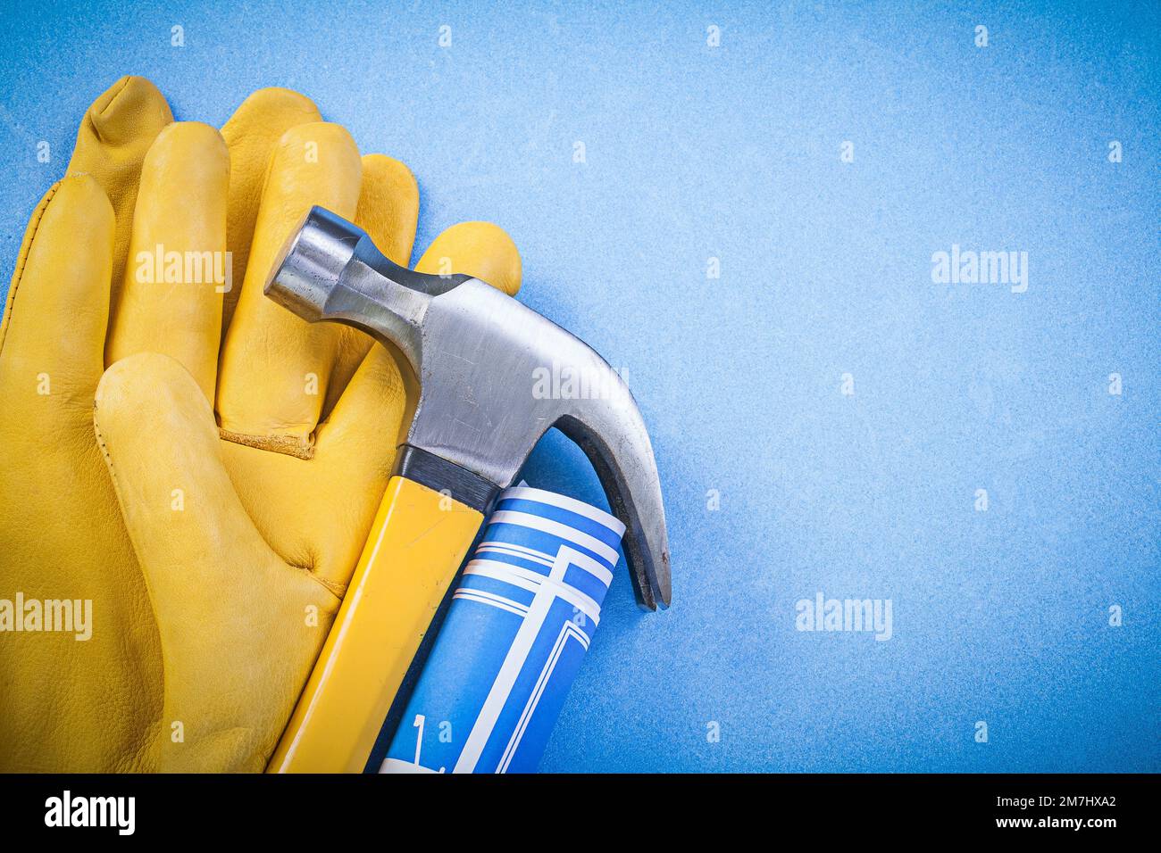 Claw hammer safety gloves engineering drawings on blue background ...